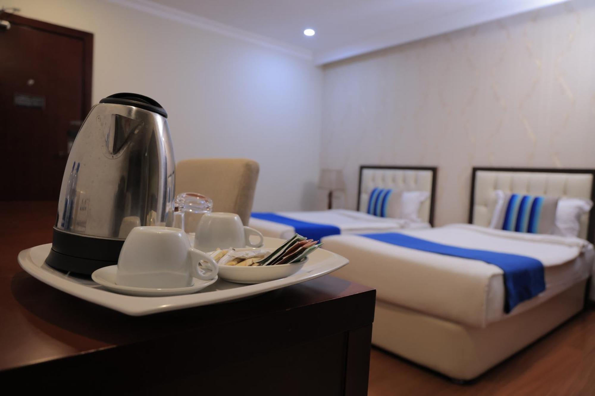 Tolip Olympia Hotel Adis Abeba Quarto foto
